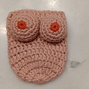 Knitted boob koozie